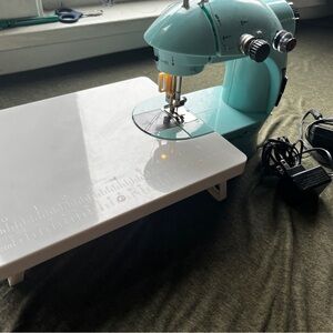 Magicfly miniature sewing machine